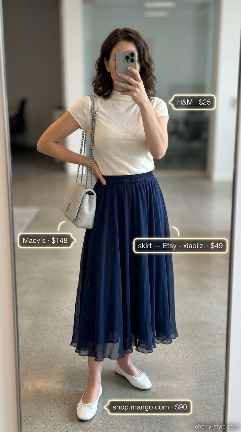 Cool summer office outfits for women 2026: Sky blue pleated midi skirt with an ivory top and ballet flats for a graceful office look.