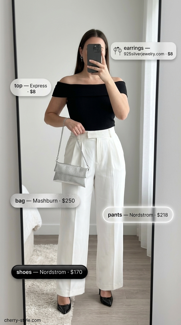 Chic black off-shoulder blouse with white tailored trousers for city evenings 2026.