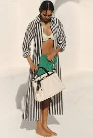 bag Anthropologie Faux Leather Trim Belted Canvas Tote anthropologie.com $54.95
