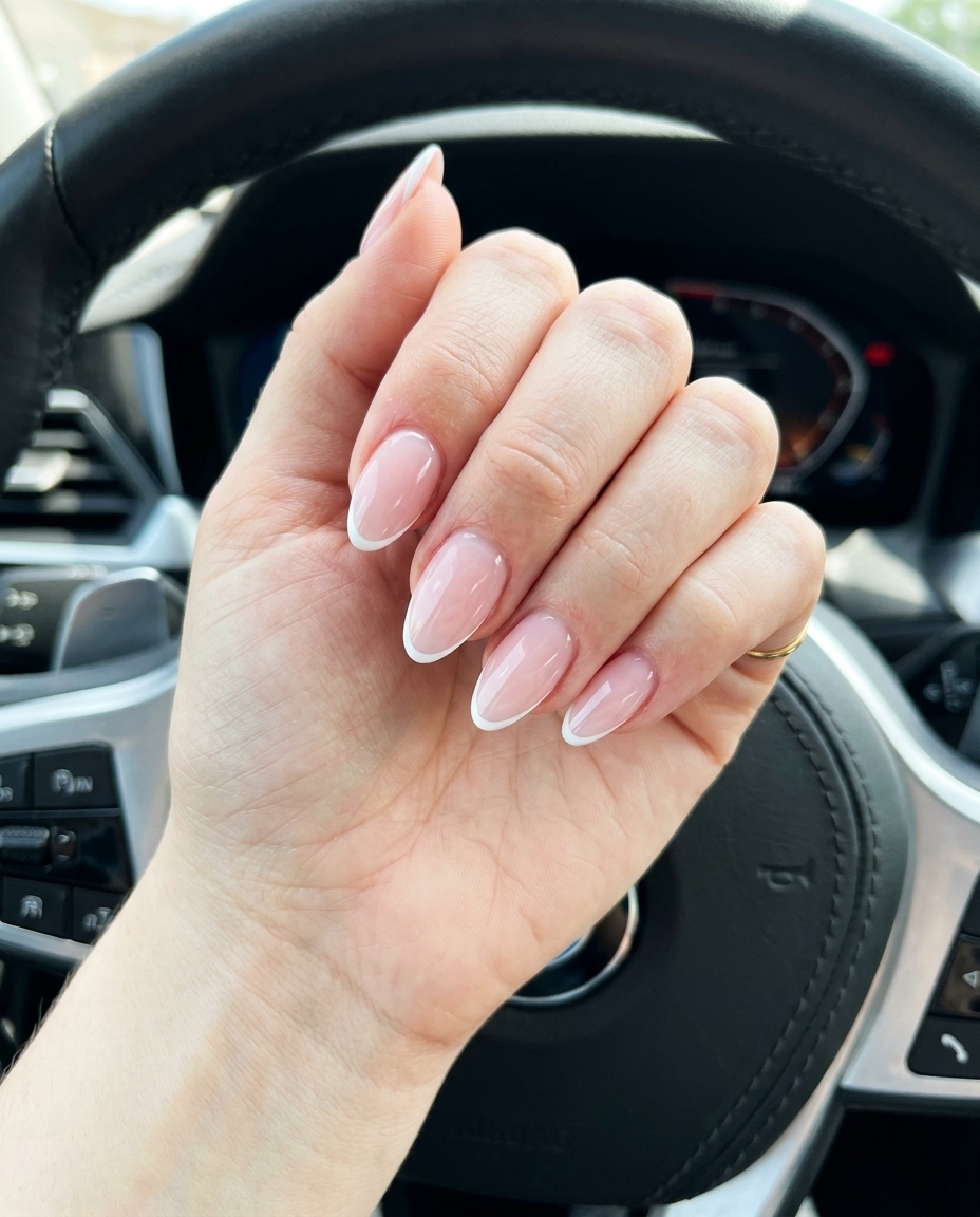 Micro French Almond Nails 2026: Classic Chic Pale Pink Micro French Almond nails for almond summer nails 2026 for fair skin. Classic and polished.