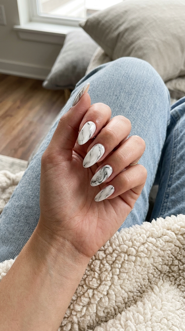 White Marble Almond Nails 2026: Elegant Style Chic White Marble Almond Accent nails for almond summer nails 2026 for fair skin. Elegant and artistic.