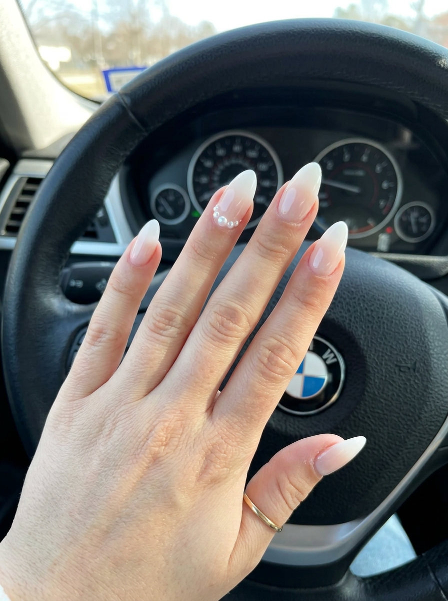 Bridal pearl ombre coffin nails with milky white and nude gradient. June manicure ideas - summer trends 2026.