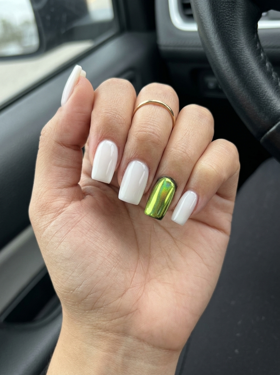 Pop of chrome lime accent nails with milky white for an edgy look. June manicure ideas - summer trends 2026.