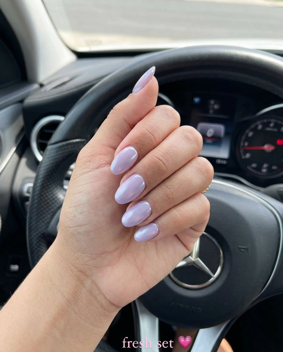 Light Lavender Oval Glazed Nails 2026 Light lavender oval glazed nails for party outfits, oval summer nails 2026 for all skin tones.