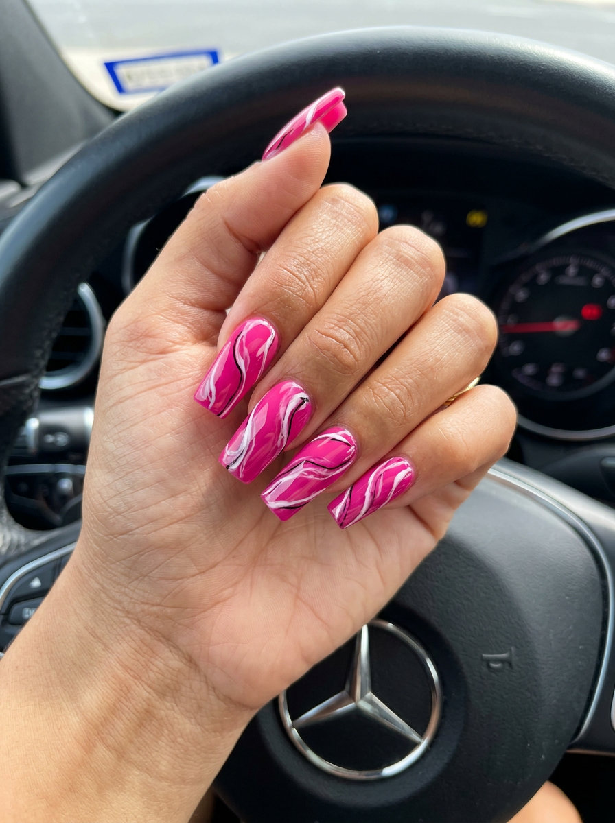 Fuchsia pink abstract swirl marble nails for sophisticated summer events. Pink summer nails 2026.