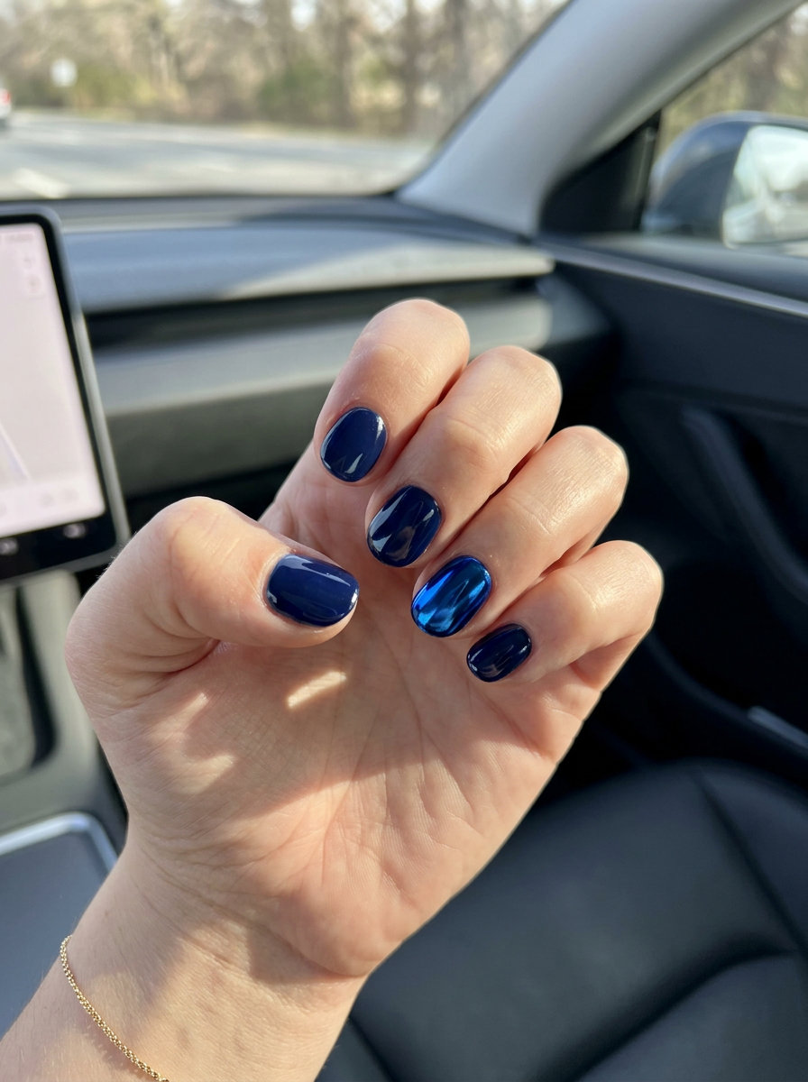 Futuristic cobalt mirror chrome accent short round nails for parties and night outs. Short round summer nails 2026.