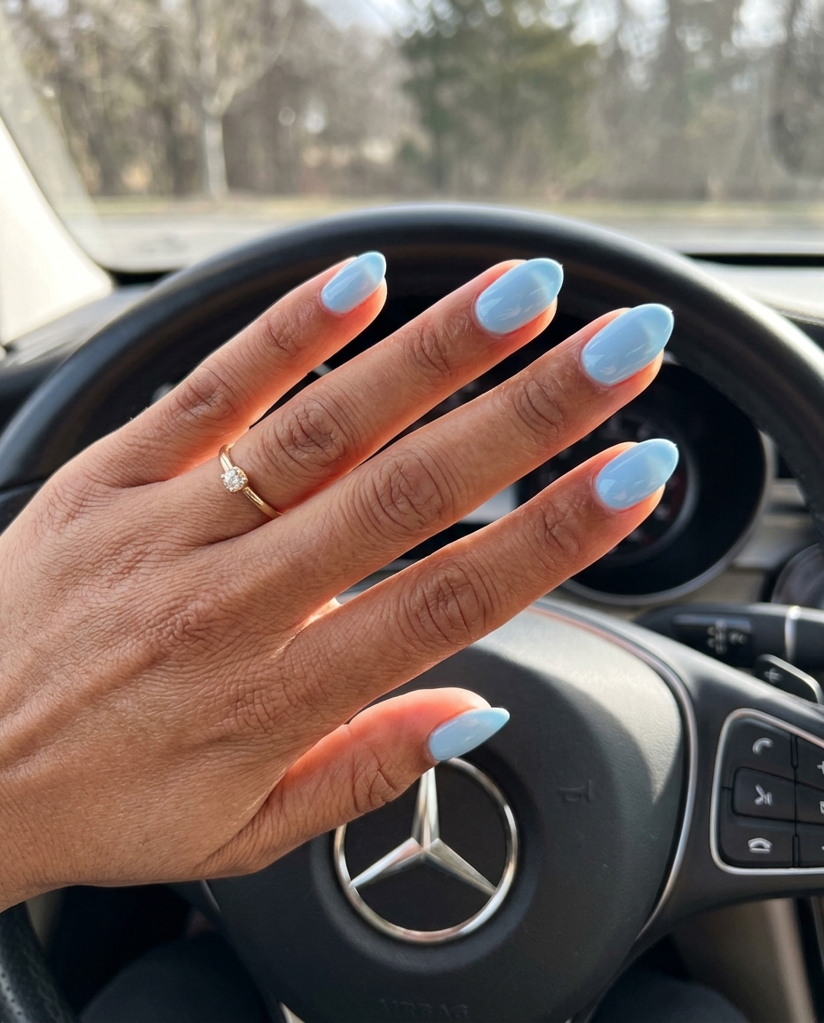 Light sky blue soft almond nails for serene simple short summer nails 2026. Relaxed vacation style.