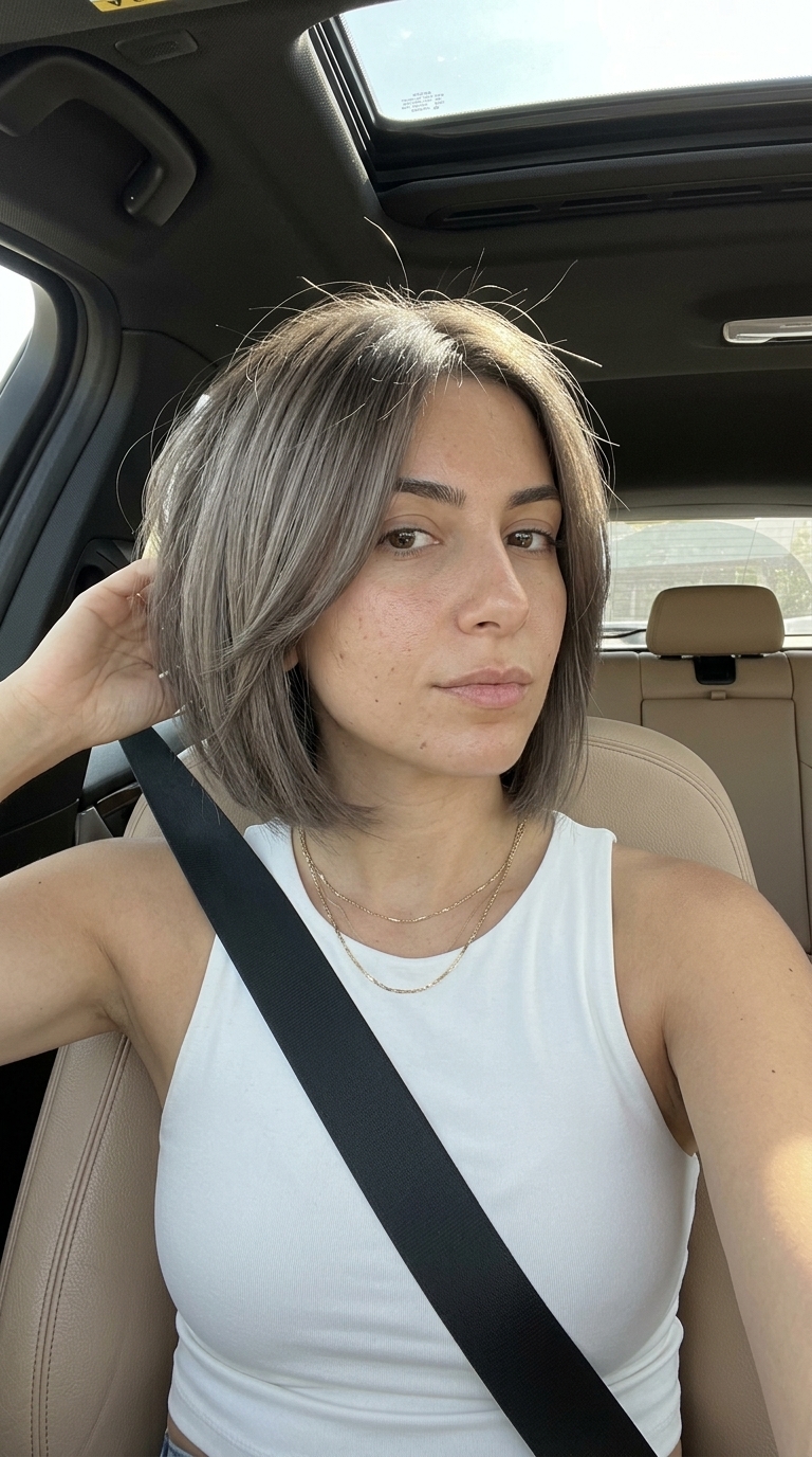 chin-length bob haircut in smoky taupe with cool grey-brown, shattered perimeter, soft