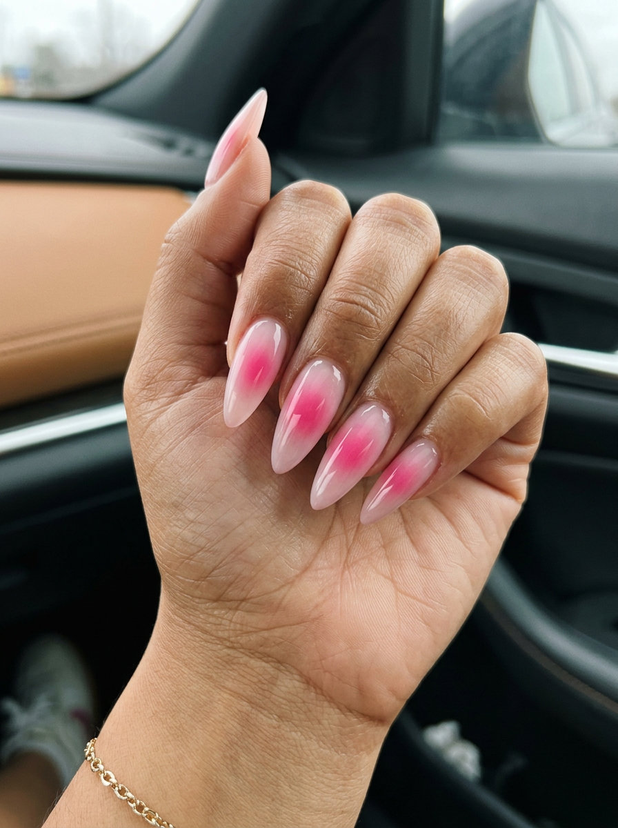 Playful hot pink aura stiletto glow nails for date nights and summer parties. Stiletto summer nails 2026.