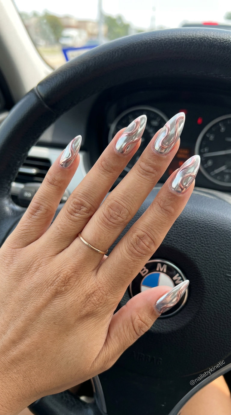 Kinetic Chrome Swirl Stiletto nails for festivals & parties in summer 2026.