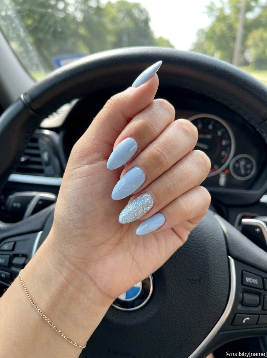 Pale blue accent nail glitter for summer classy nails 2026. Playful, sparkling style for parties and summer events.
