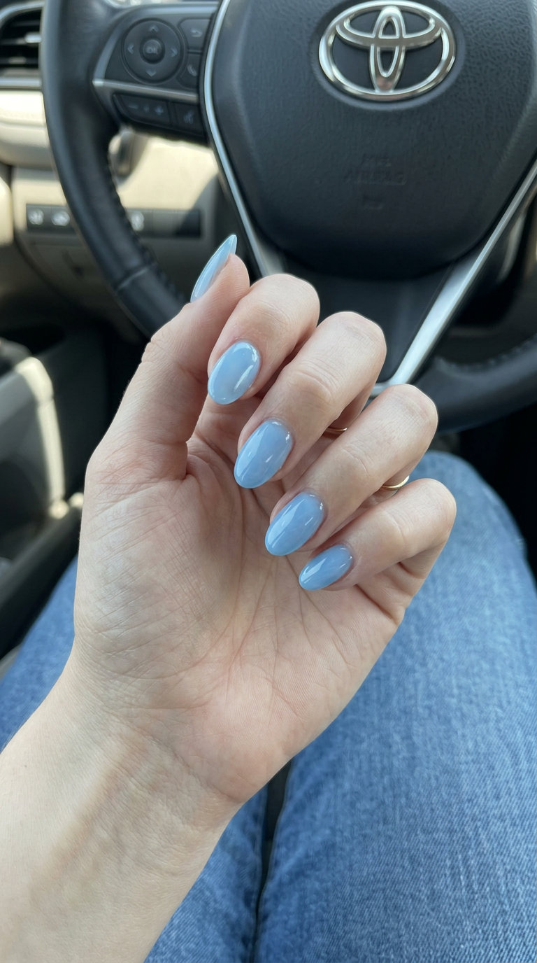 Sheer sky blue glossy manicure for summer 2026, perfect for daily wear and work. Minimalist clean-girl style.