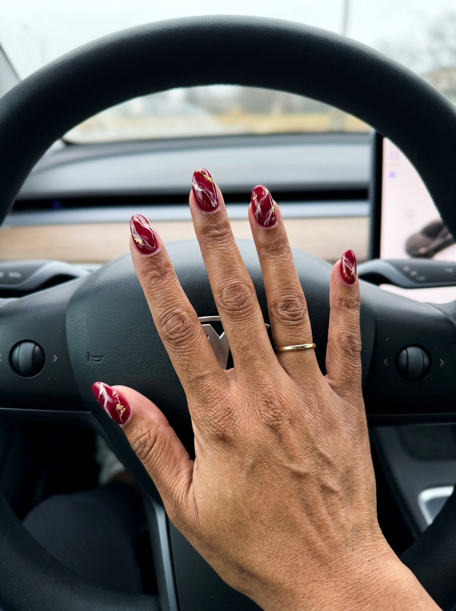 Ruby Red Marble Effect Nails 2026: Polished Event Style Ruby Red Marble Effect nails for summer 2026. Sophisticated, artistic, and polished for events.