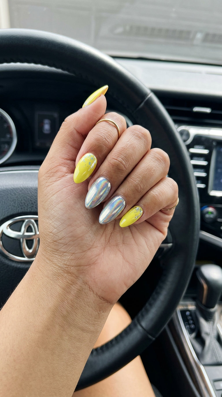 Bold lemon zest yellow chrome nails for nights out and festivals. Yellow summer nails 2026.